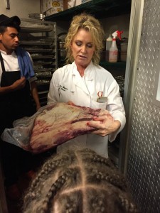 Chef Lee Ann Whippen with a hunk of Wagyu beef