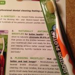 Doctorr Plotka's flossing-bristle toothbrush